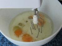 Beat together eggs, milk, oil and sugar....