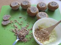 Cut top of the baked muffins and with the teaspoon...