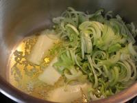 Wash the leek, cut and fry in butter. Add salt and...