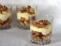 Crush ladyfingers into the deeper cups (2 pieces...