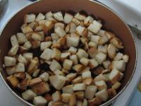 Cut the rolls into small cubes and fry dry in a...