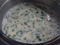 Pour milk into a bowl, add eggs, salt, fresh basil...