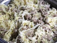 ... add sauerkraut. Stir and braise for 15...