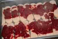 Pour prepared raspberry sauce equally on top of...