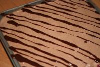 Meanwhile melt chocolate with cream in a water...