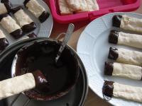 On the other day melt the chocolate topping over a...
