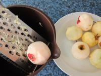 Peel apples and grate them coarsely....