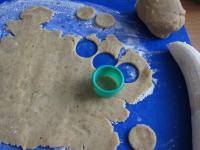 Use a rolling pin to spread one half on a floured...