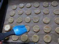Place the rounds on a baking tin with parchment...