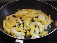 Add the cleaned, chopped onion to the potatoes and...