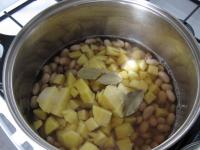 Add peeled, chopped small cubes of potatoes into...