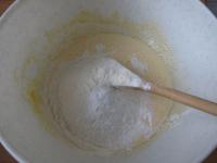 Beat egg yolks with sugar. Blend in water and...