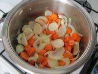 Peel the vegetable, wash and cut into the bigger...
