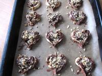 Sprinkle the surface with chopped nuts and bake in...
