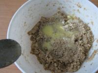 Mix ground walnut with sugar and pour in rum. Add...