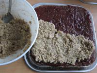 Spread walnut filling across the jam.......