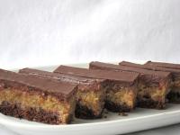 If topping hardens totally, cut the cake with...