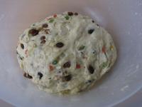 Knead well again, cover and let it raise for half...