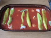 Pour the puree over the peppers in dish, cover and...