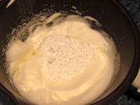 Beat egg whites and sugar into stiff foam....