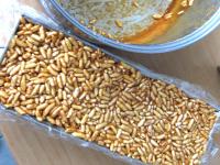Place puffed rice-caramel mixture into the pan and...