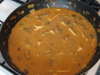 Pour the roux to the tofu-mushroom mixture. Boil...