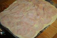 ...evenly lay slices of ham......