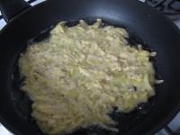 From around three spoons of mixture create large...