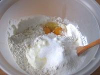 Sift the flour into the bowl, add sugar, pinch of...