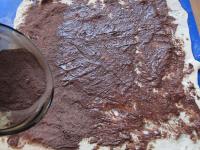 Split the raised dough into halves. Use a rolling...
