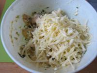Add roughly grated hard cheese into the stuffing...