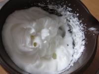 Beat the egg whites until stiff peaks form....