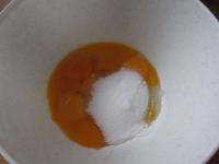 Whisk the egg yolks with sugar into the foam....