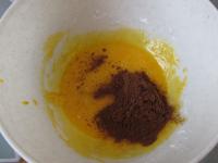 Beat egg yolks with sugar and cocoa powder....