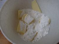 Beat together butter and sugar and mix it with...