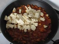 Add sliced tofu, mix and warm up....
