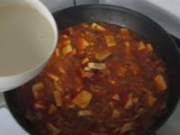 Pour the mixture to the tofu and cook for 5...