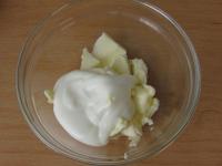 In a bowl mix butter with the cheese....