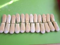 Cut long sponge fingers into halves. ...
