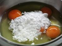 Whip the eggs with sugar....