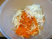Peel carrot and radish, grate them coarsely. Put...