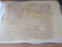 Roll out puff pastry on floured board into the...