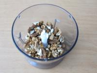 Put walnuts in the kitchen chopper and chop them...
