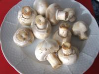 Wash the mushrooms and cut them into slices....