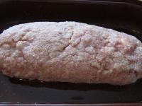 Transfer the meatloaf to the baking tin and pour...