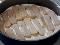 Spread a little of cream over the bottom of cake...