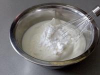 Mix to combine sour cream with sugar and put half...