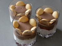 Place sponge biscuits on the surface, dip them...
