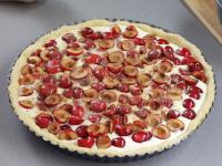 Place stoned cherries over the surface and...