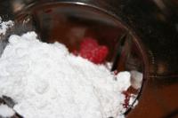 ... add ice cubes, sugar and mix well, so that...